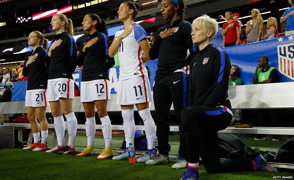 Megan Rapinoe kneeling