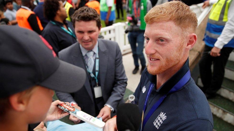 Ben Stokes signing autographs