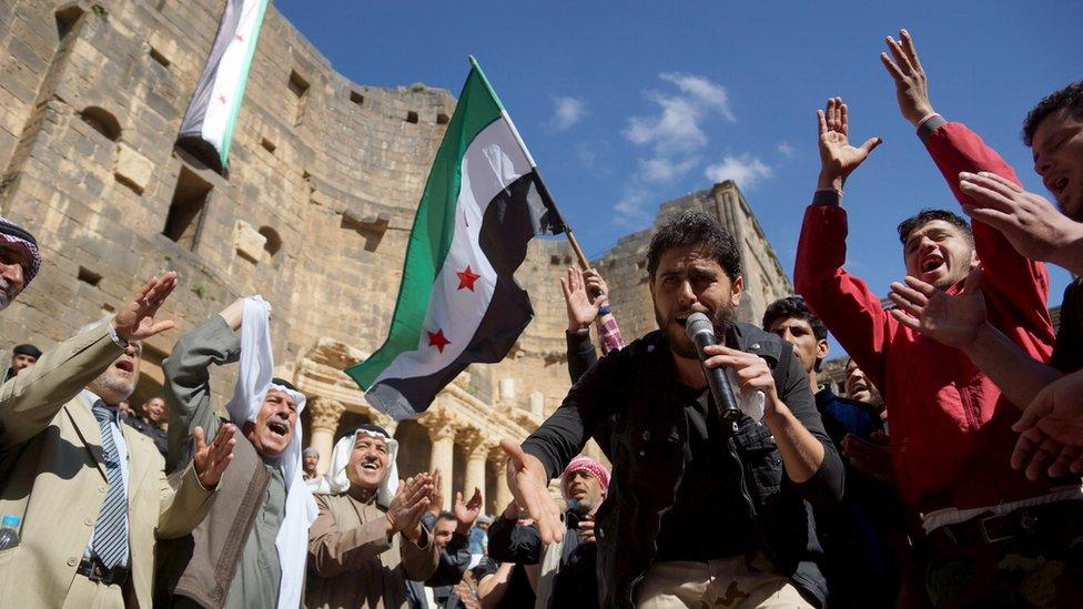 Anti-government protest inside a 2nd century Roman amphitheater in Bosra near Deraa March 4, 2016