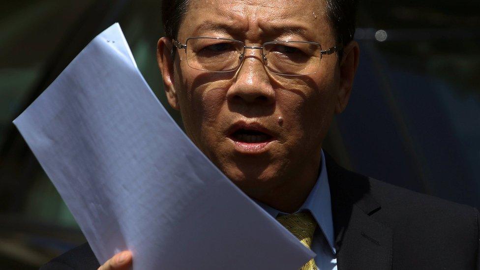 North Korean Ambassador to Malaysia, Kang Chol, waves paper as he speaks outside the embassy in Kuala Lumpur, Malaysia (February 20, 2017)