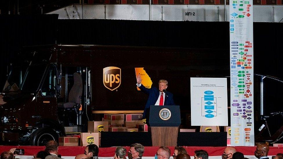 President Donald Trump arrives to speak at an event at the United Parcel Service (UPS) Airport Facility in Atlanta, Georgia