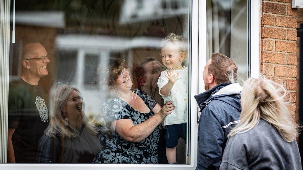 Charlotte Cole and her husband Daniel visit their son George, 2