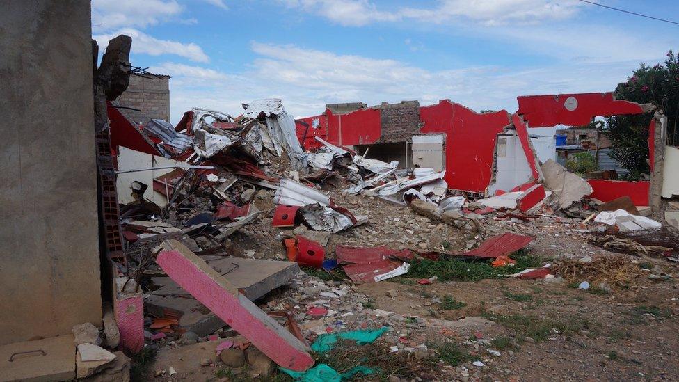 Demolished houses in San Cristobal