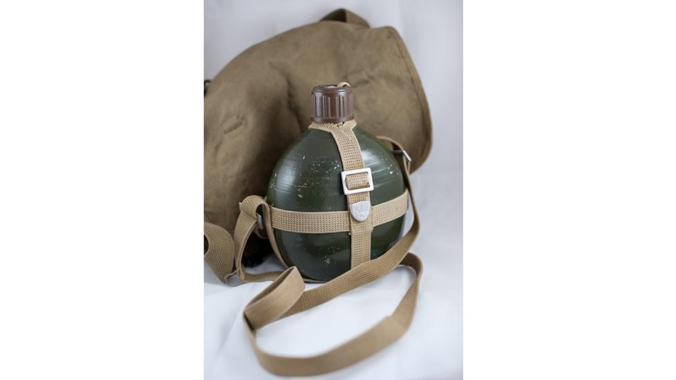 Army water can and green bag