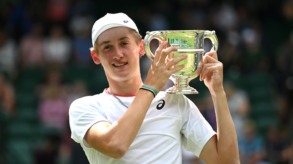 Henry Searle with the Wimbledon Boys trophy