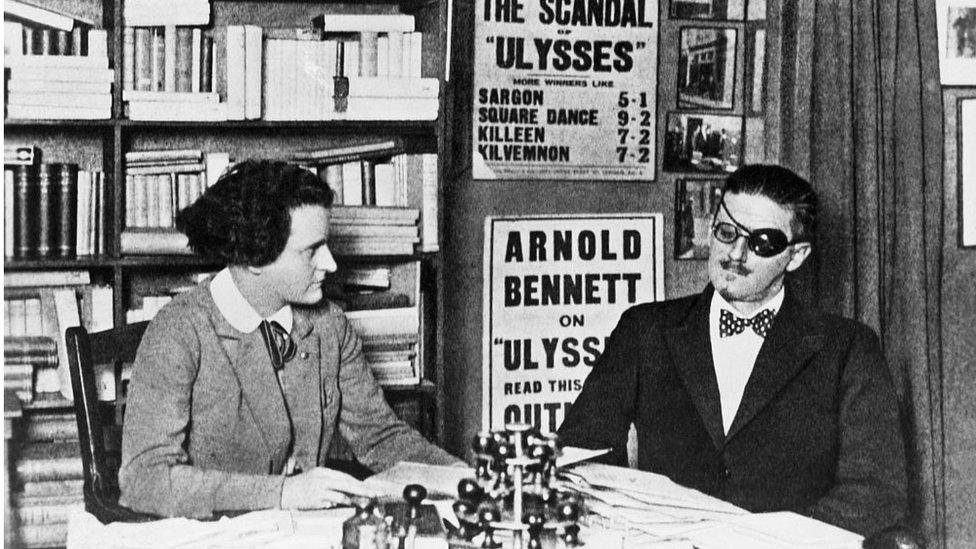 Author of Ulysses James Joyce and his publisher Sylvia Beach in an office in Paris