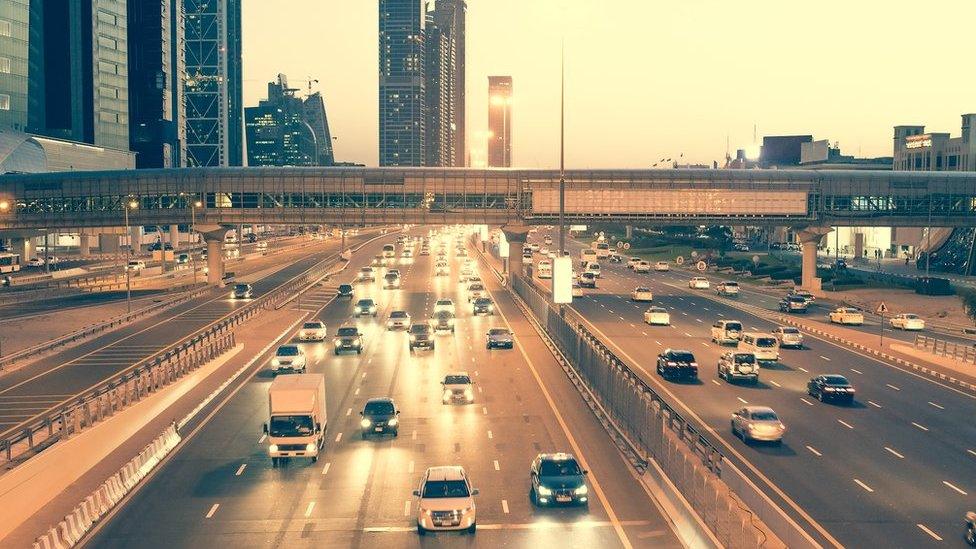 Skyscraper roads and bridge at the Sheikh Zayed Road in Dubai in the evening