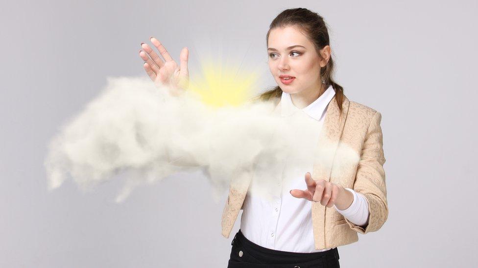 Woman with cloud and sun