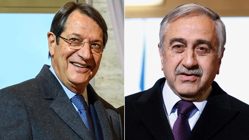 Greek Cypriot leader Nicos Anastasiades (L) and his Turkish Cypriot counterpart Mustafa Akinci (R) arrive in Geneva