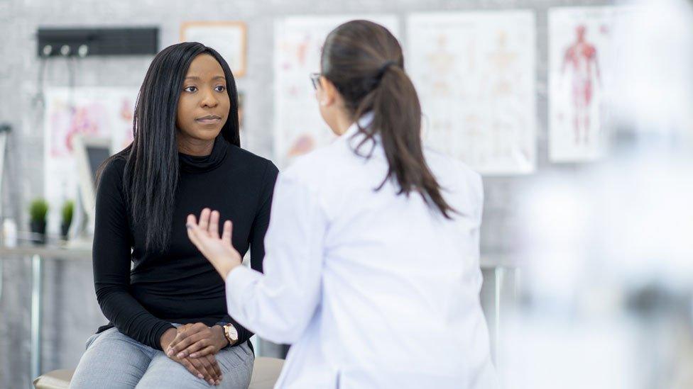 A stock image of a doctor and patient