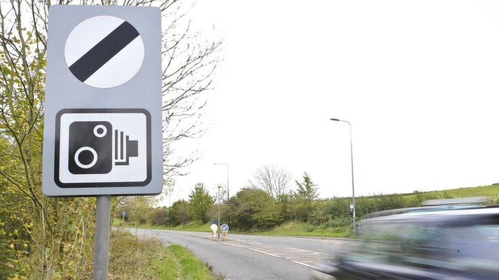 A speed camera sign