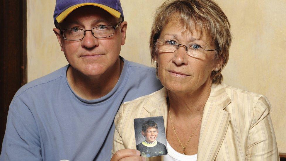 Patty and Jerry Wetterling show a photo of their son Jacob Wetterling. August 2009