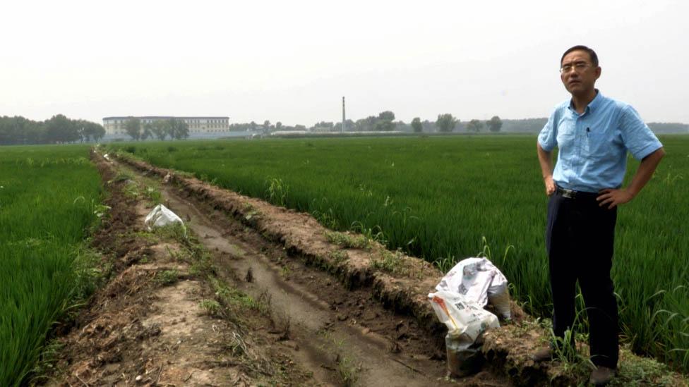 Sun Yi outside Masanjia after his release