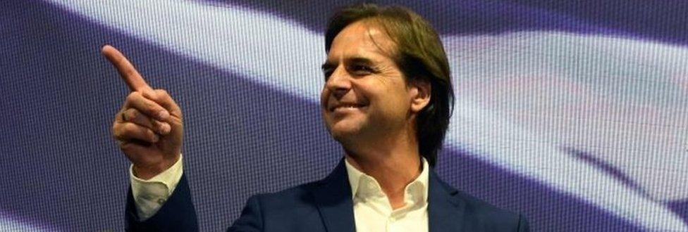 The presidential candidate for Uruguay's Partido Nacional party, Luis Lacalle Pou gestures while addressing supporters in Montevideo after polls closed