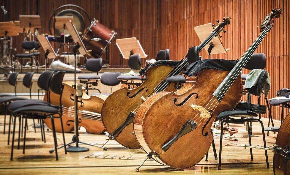 Orchestra instruments in a performance space