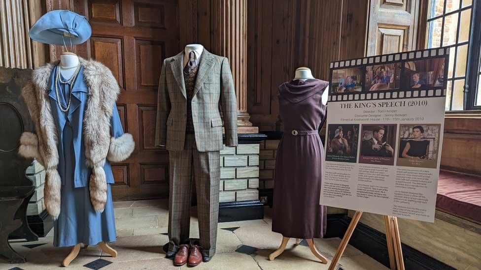 Costumes worn by Helena Bonham Carter (Queen Elizabeth, The Queen Mother), Guy Pearce Edward VIII, The Duke of Windsor) and Eve Best (Wallis Simpson) form the display for 'The King's Speech