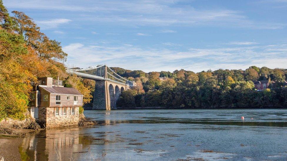 A view of the Menai Strait and Menai Bridge beside Belgian Prom on Anglesey