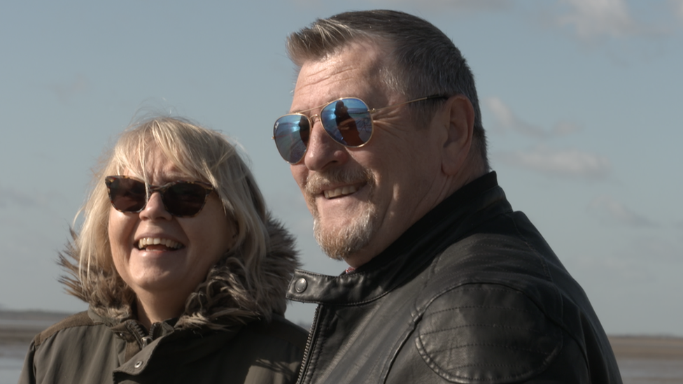 Maria and Don Miles smiling while standing on Southend Sea front