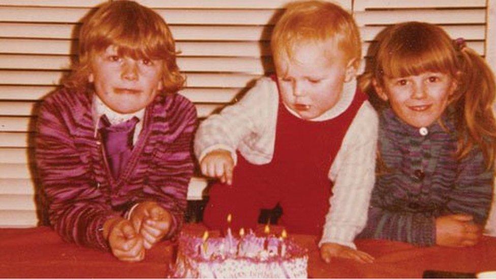 A young Stephen Martin with his sisters