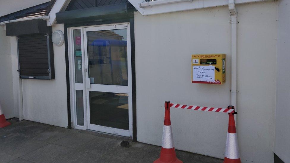 Damaged Defibrillator outside club