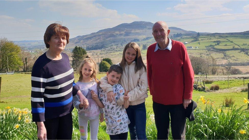 Eimear's parents and children during a trip home