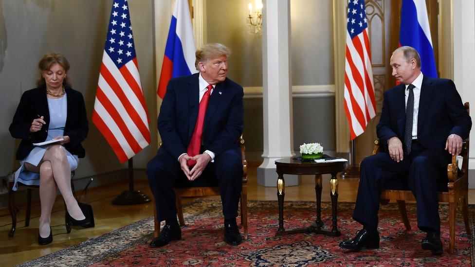 US interpreter Marina Gross (left) with President Donald Trump (centre) and Russian President Vladimir Putin in Helsinki, 16 July