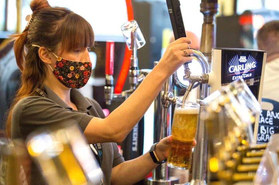 Bar worker at the Horseshoe Bar in Glasgow