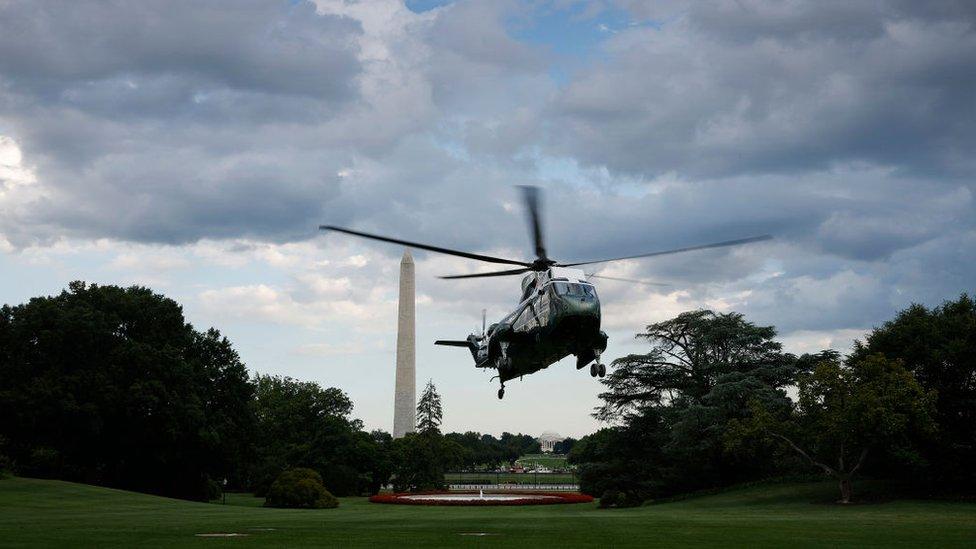 Mr Biden's helicopter departs Washington