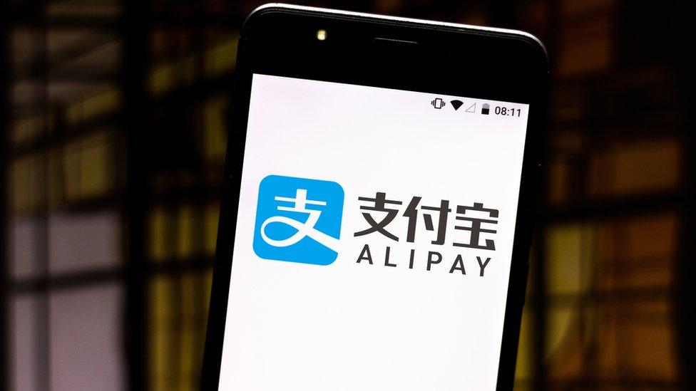 A mobile phone using the Alipay application