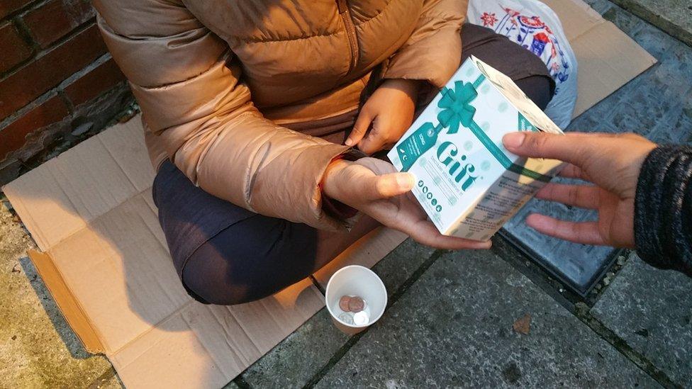 Homeless woman receives sanitary towels