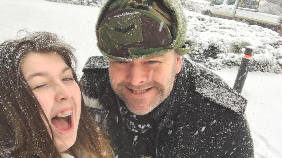 Ella and her father in the snow