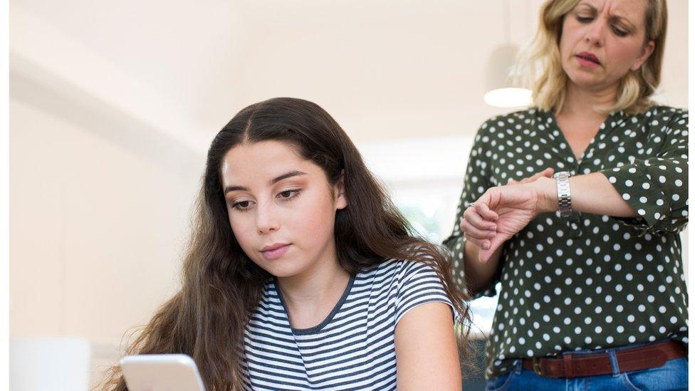 Mum getting annoyed about daughter's use of social media