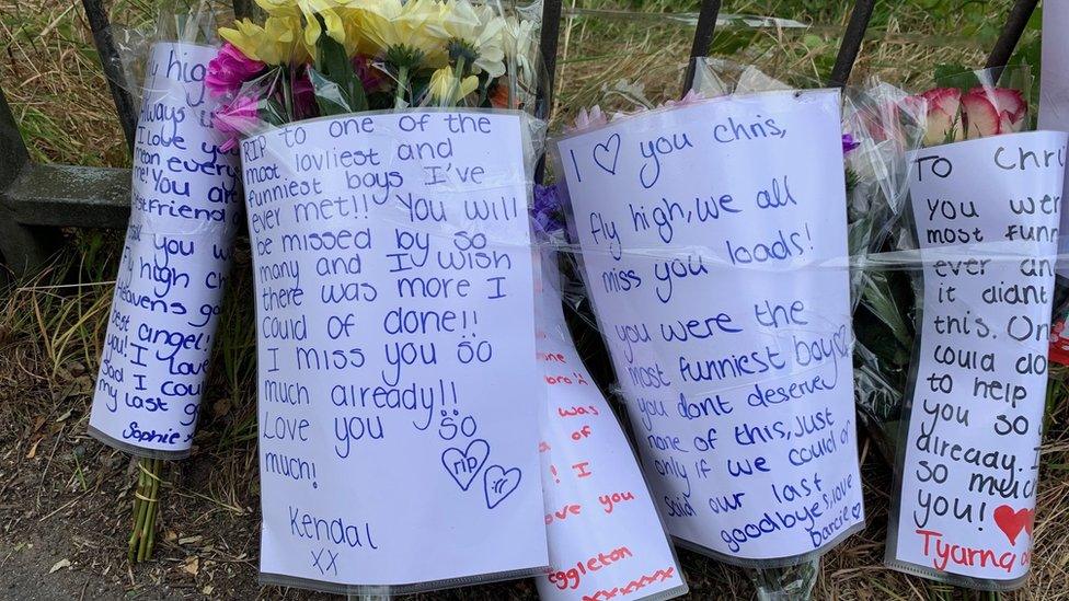 Written tributes at the scene