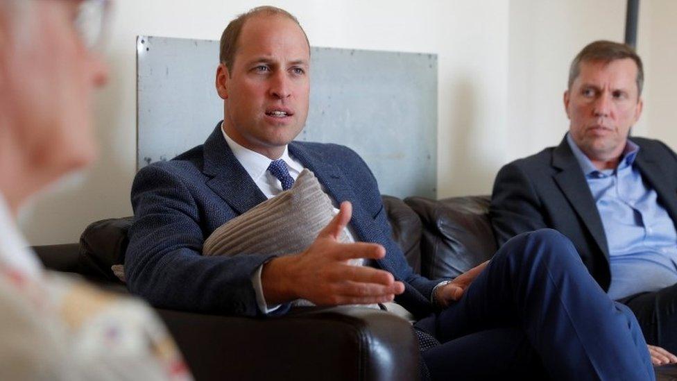 Prince William with staff at Sporting Chances