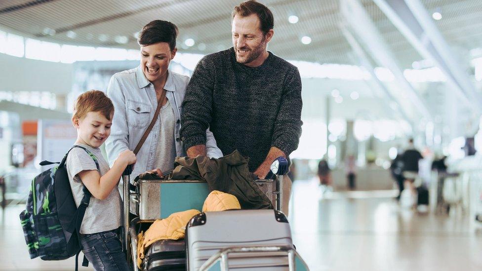 A family at the airport