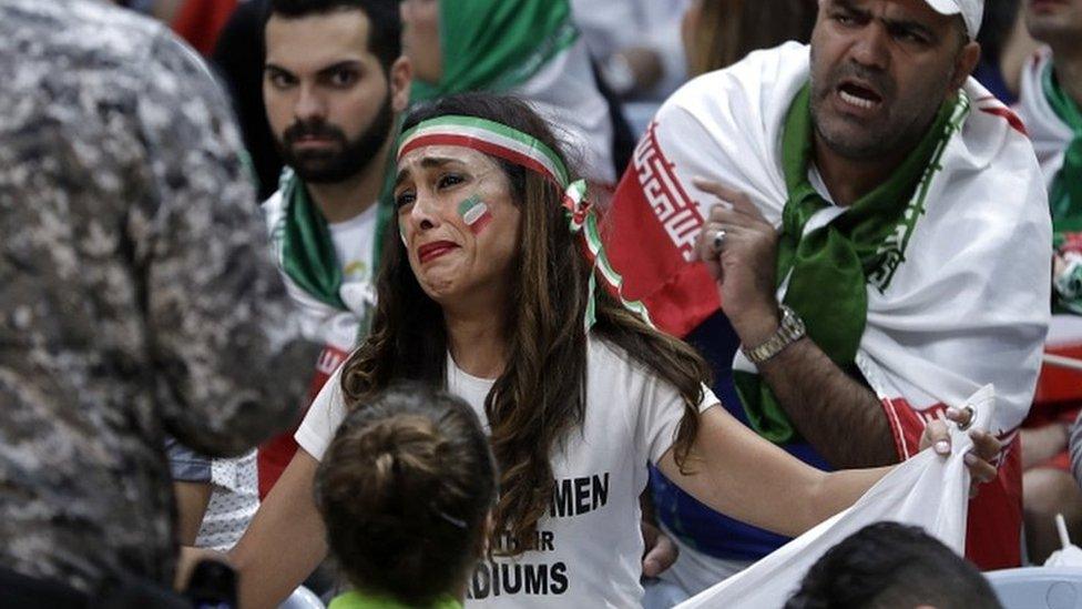 Darya Safai cries as she is asked to drop her protest sign (13 August 2016)