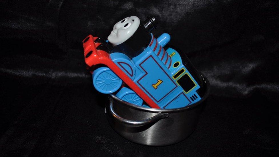 Thomas the Tank engine model in a bucket