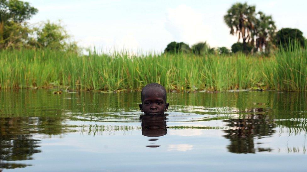 A displaced girl plays in the Sudd Swamp near the town of Nyal, South Sudan - Sunday 19 August 2018