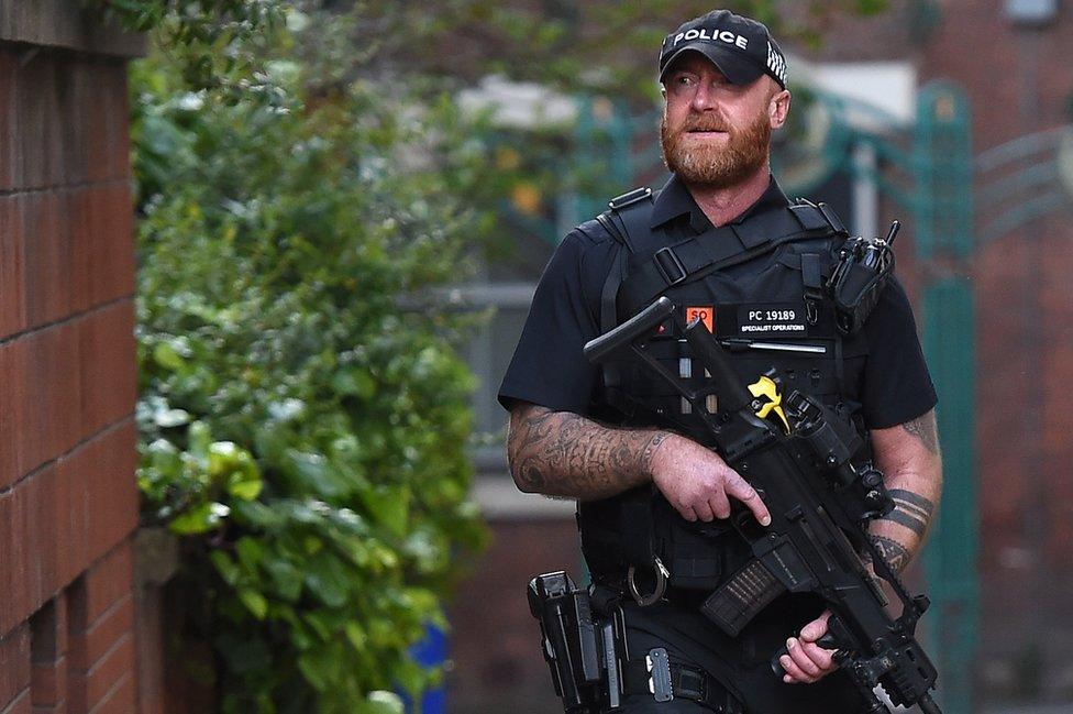 Armed police on patrol in central Manchester, 23 May