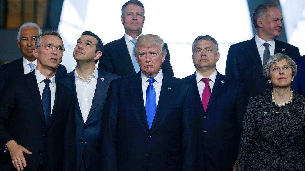 Portuguese Prime Minister Antonio Costa, NATO Secretary General Jens Stoltenberg, Greek Prime Minister Alexis Tsipras, U.S. President Donald Trump, Hungarian Prime Minister Voktor Orban and Britain's Prime Minister Theresa May pose for a family photo during a NATO summit at their new headquarters in Brussels, Belgium, May 25, 2017.