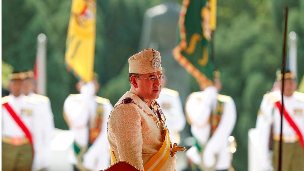 Sultan Muhammad V stands during his welcome ceremony at Parliament House in Kuala Lumpur, Malaysia, 13 December 2016.