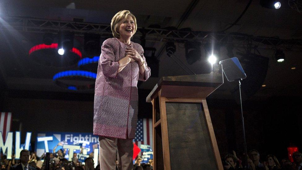 Hillary Clinton, former Secretary of State and 2016 Democratic presidential candidate, reacts on stage during an election night party in New York, U.S., on Tuesday, 19 April, 2016.