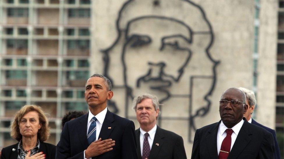 US President Barack Obama with Cuban and US officials in Revolution Square with mural of Che Guevara in the background, Havana 21 March 2016