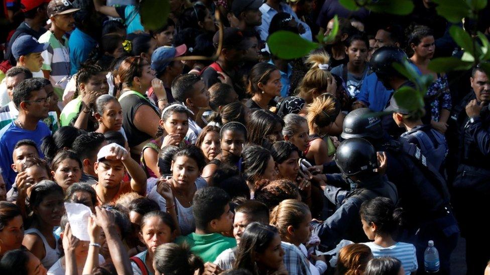 Anxious relatives gathered for news in Valencia, Carabobo