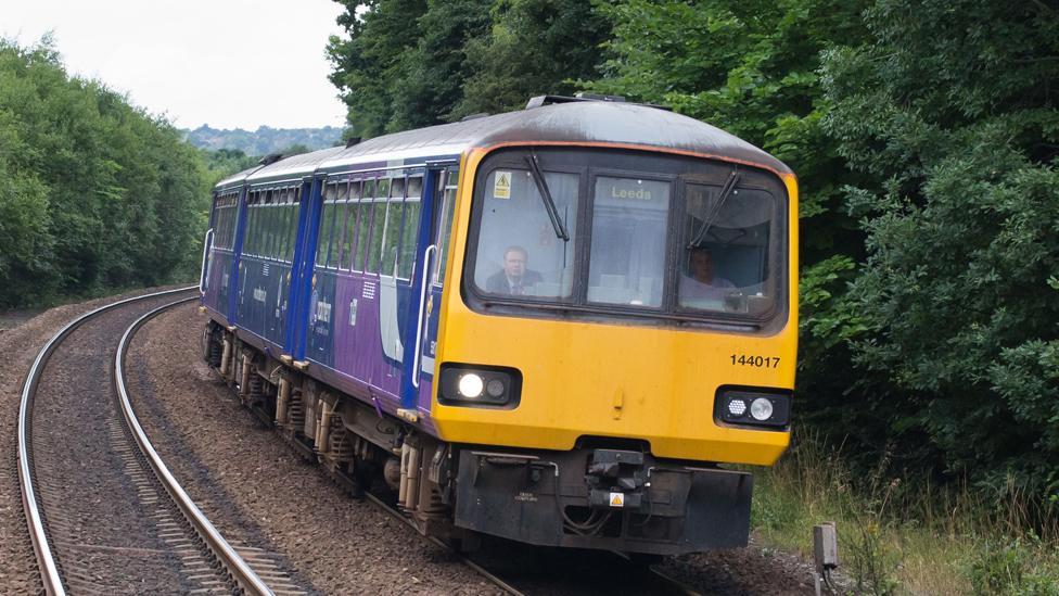 Pacer train on the mainline approaching Deighton station near Huddersfield, West Yorkshire