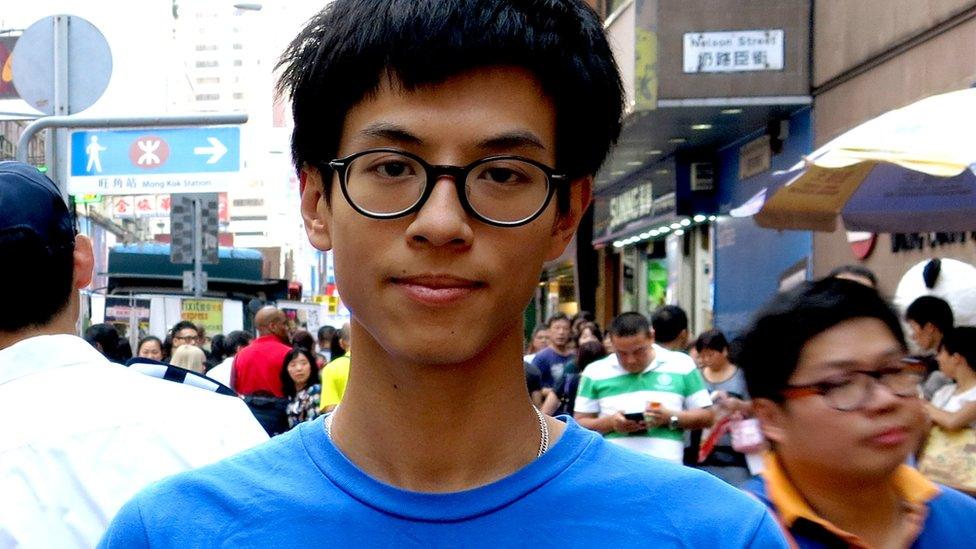 BBC CHINESE PHOTO / MARTIN YIP: "Localist" activist Ray Wong (R) from the group Hong Kong Indigenous poses for photos at the shopping district of Mong Kok, 13 Oct 2015, in Kowloon, Hong Kong.