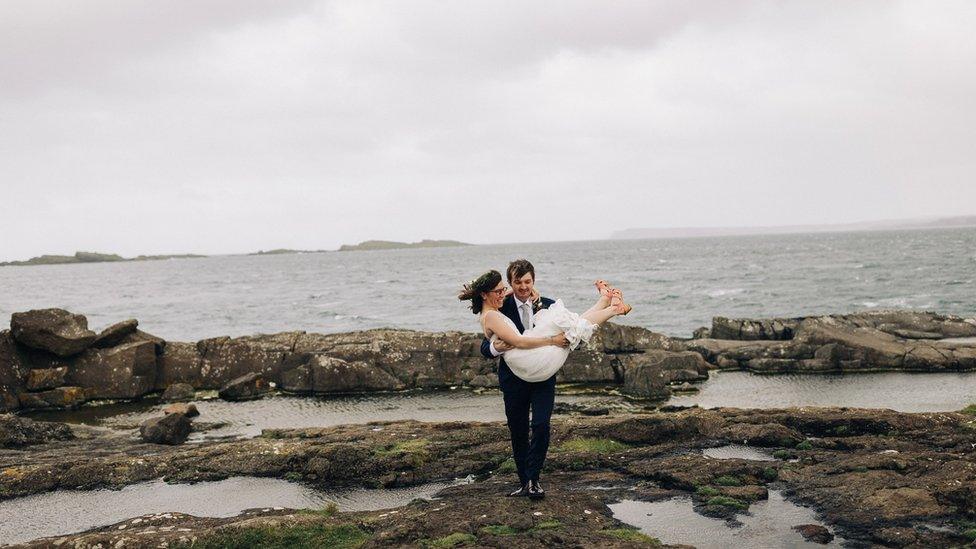 Thomas and Amber Hamilton braved the storm to get their wedding photographs