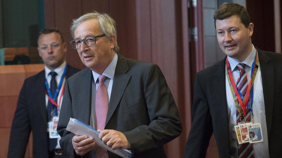 EU Commission President Jean Claude Juncker (C) arrives with his Chief of Cabinet Martin Selmayr (R), June 11, 2015