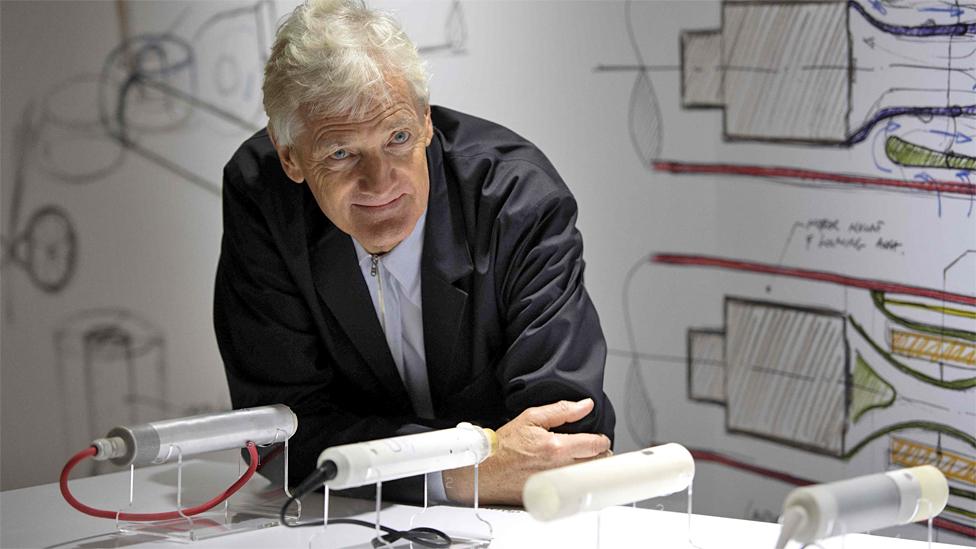 File image of Sir James Dyson posing with products