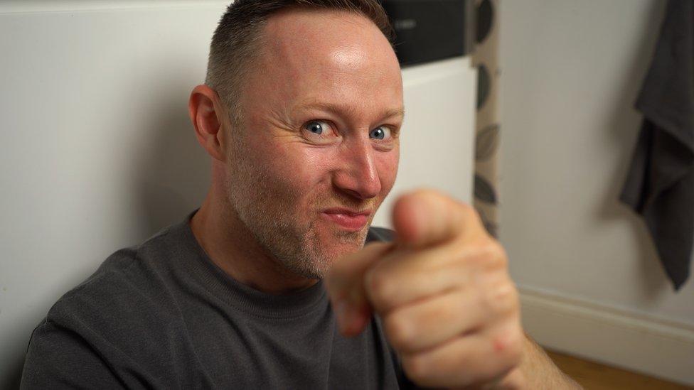 Limmy sitting on the kitchen floor, episode 1